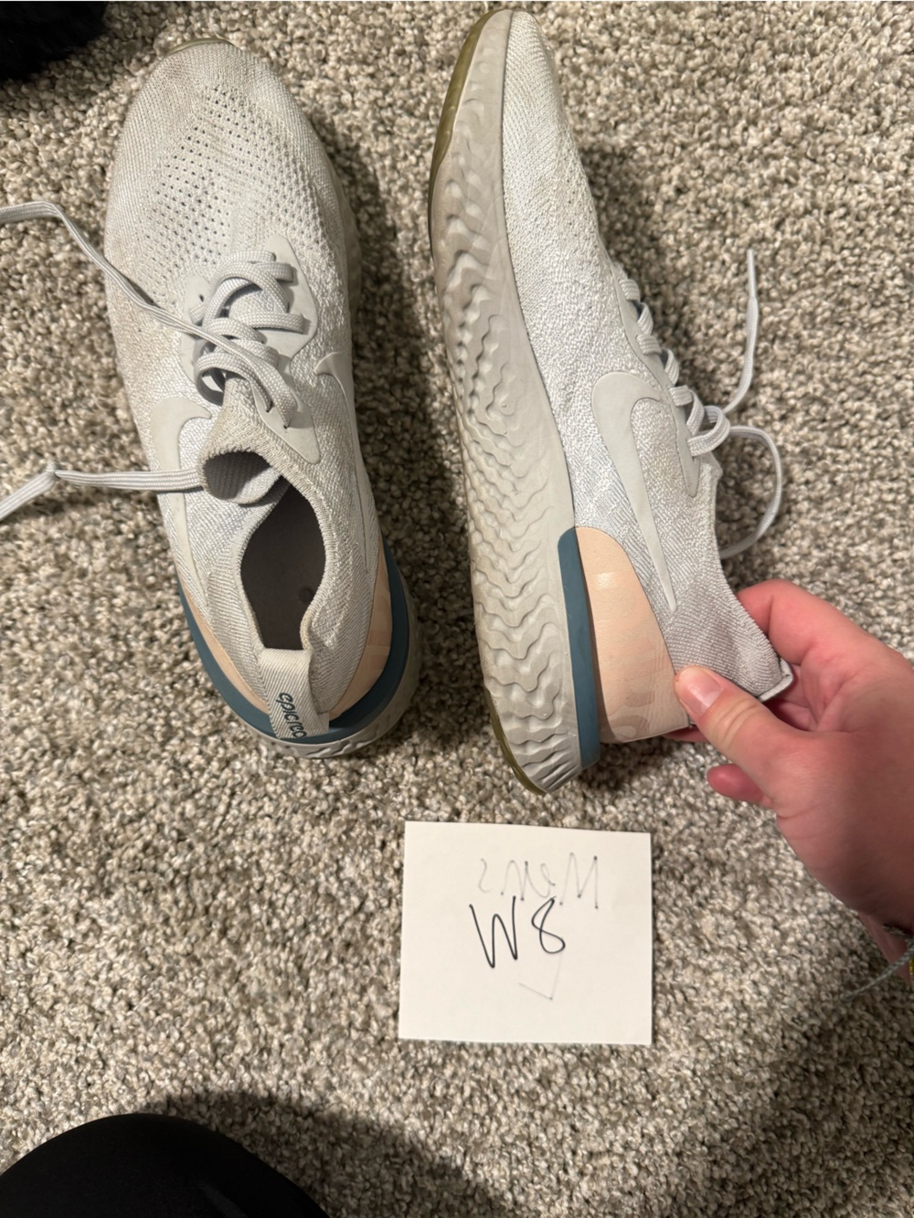 Nike Women's Light Gray Knit Running Shoes with Blue and Beige Accents